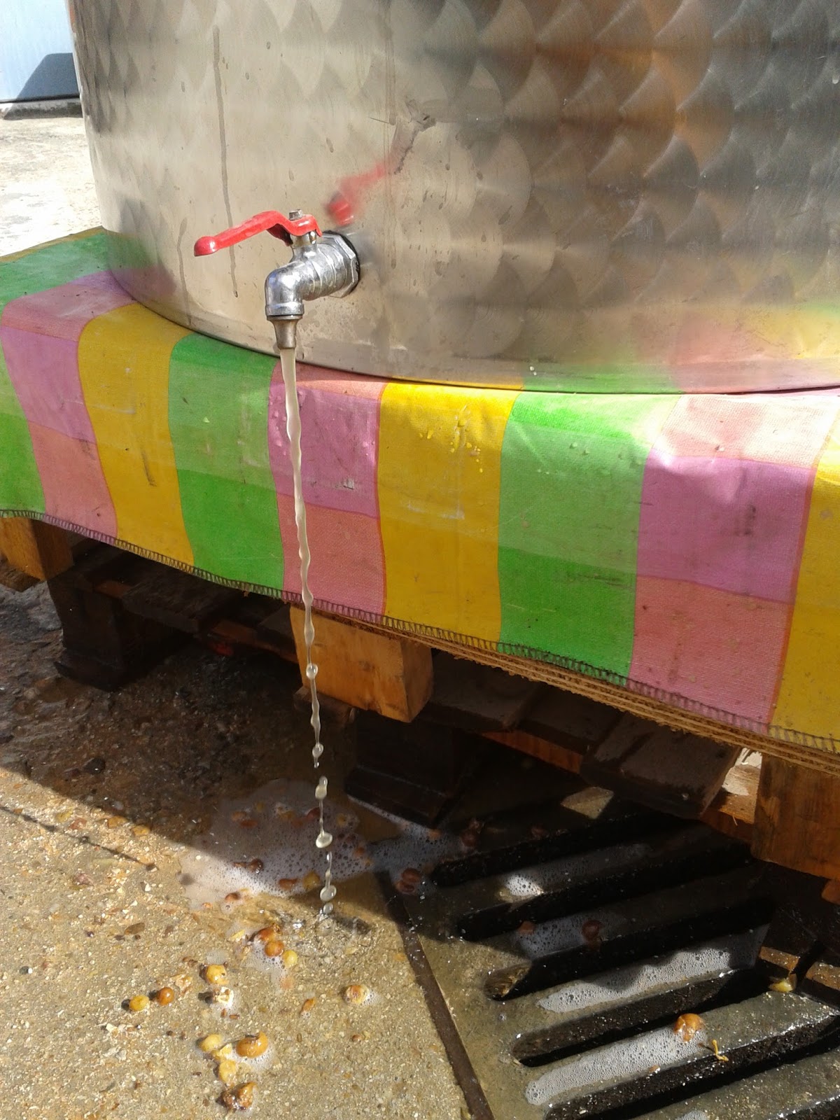 Vinos Pouring Wine Down the Drain