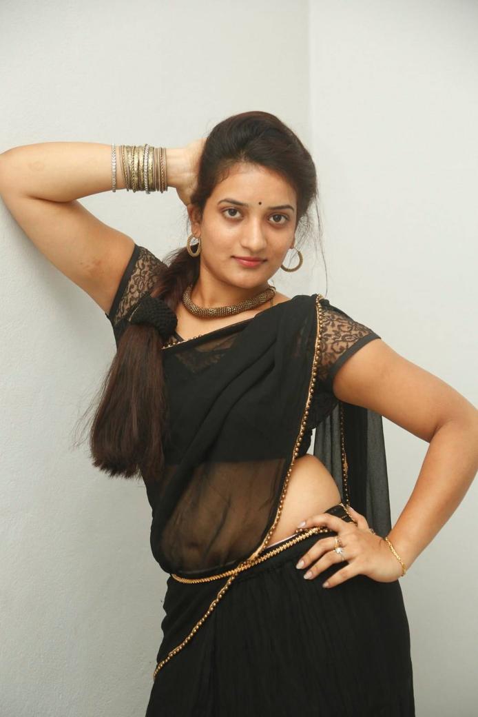 Beautiful Telugu Girl Hip Navel Show Stills In Black Saree Janani