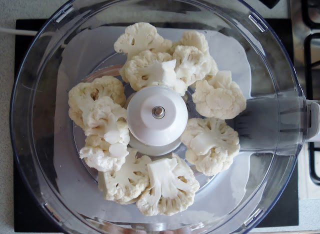 Wash the cauliflower and break into florets