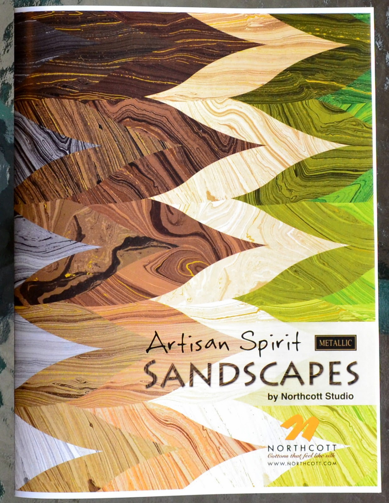 http://www.northcott.net/?keyword=sandscapes&filterlist=0&searchurl=%3Fsid%3D2%26layout%3D1col%26content%3Dsearch&x=0&y=0