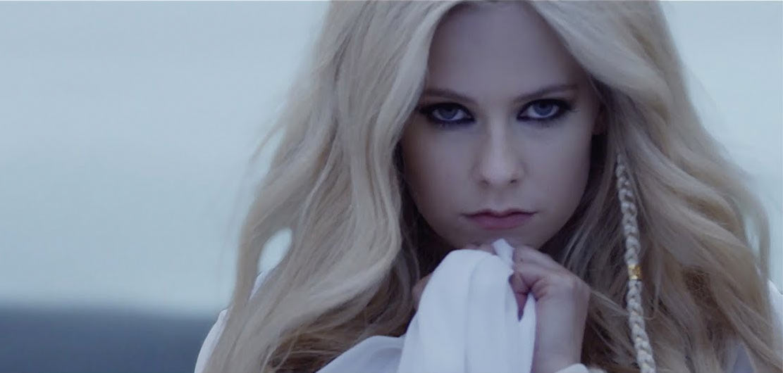 avril lavigne goes back to her origins in head above water my