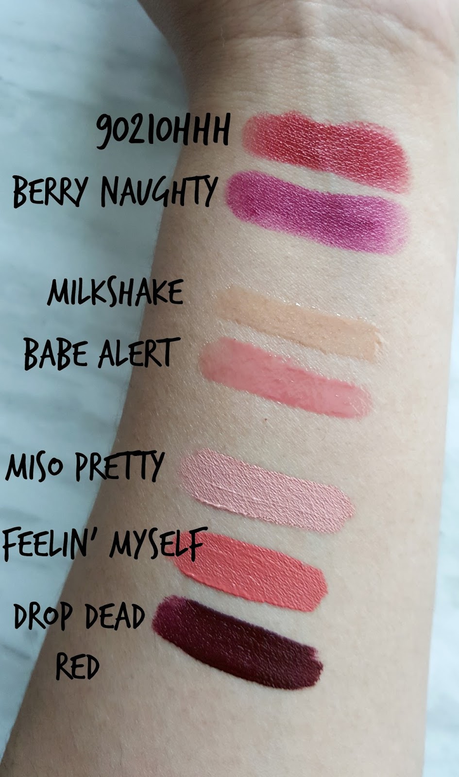 Too Faced La Creme Color Drenched Lip Cream in 90210hhh and Berry Naughty. 