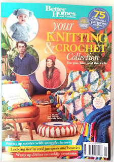 The cover of the 2017 Better Homes & Gardens Knitting & Crochet Collection magazine displays a tan leather lounge setting featuring two bright throw rugs and cushion in tropical colours plus a round footstool or pouffe covered in round tapestry crochet and tassels. Three round inset photographs display a baby, man and woman respectively modelling their outfits of  light grey-blue pom pom baby hat and tunic, dark blue polo jumper and red beanie and coat. Starbursts in the top right corner announce "75 fabulous patterns you'll love" and "Big bonus learner's guide" . Headlines: "Warm up winter with snuggly throws", "Looking hot in cool jumpers and beanies" and " Wrap up littlies in cuddly creations"