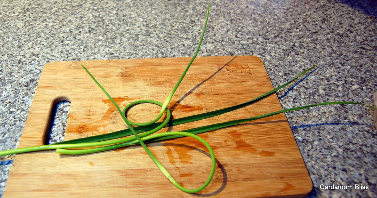 Cardamom Bliss It's not your mamma's cooking Garlic Scape Bhurji (Eggs)