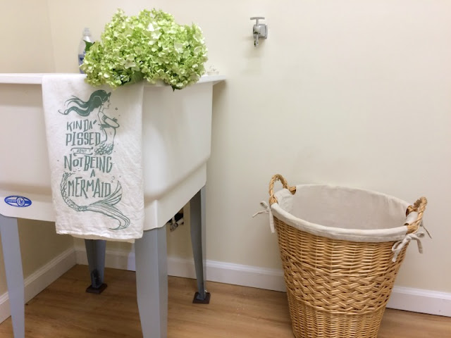 You do not have to spend a fortune to have a beautiful laundry room. Get my tips for how we built a laundry room from scratch on a budget.