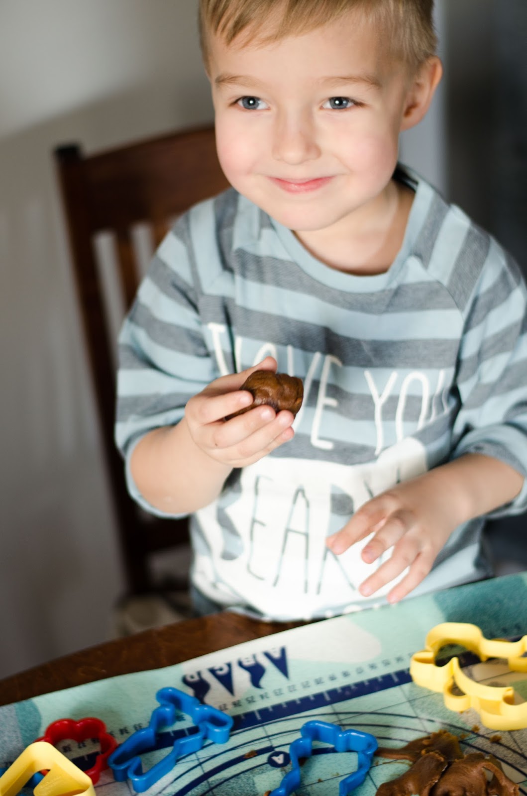 boy toddler making gingerbread
