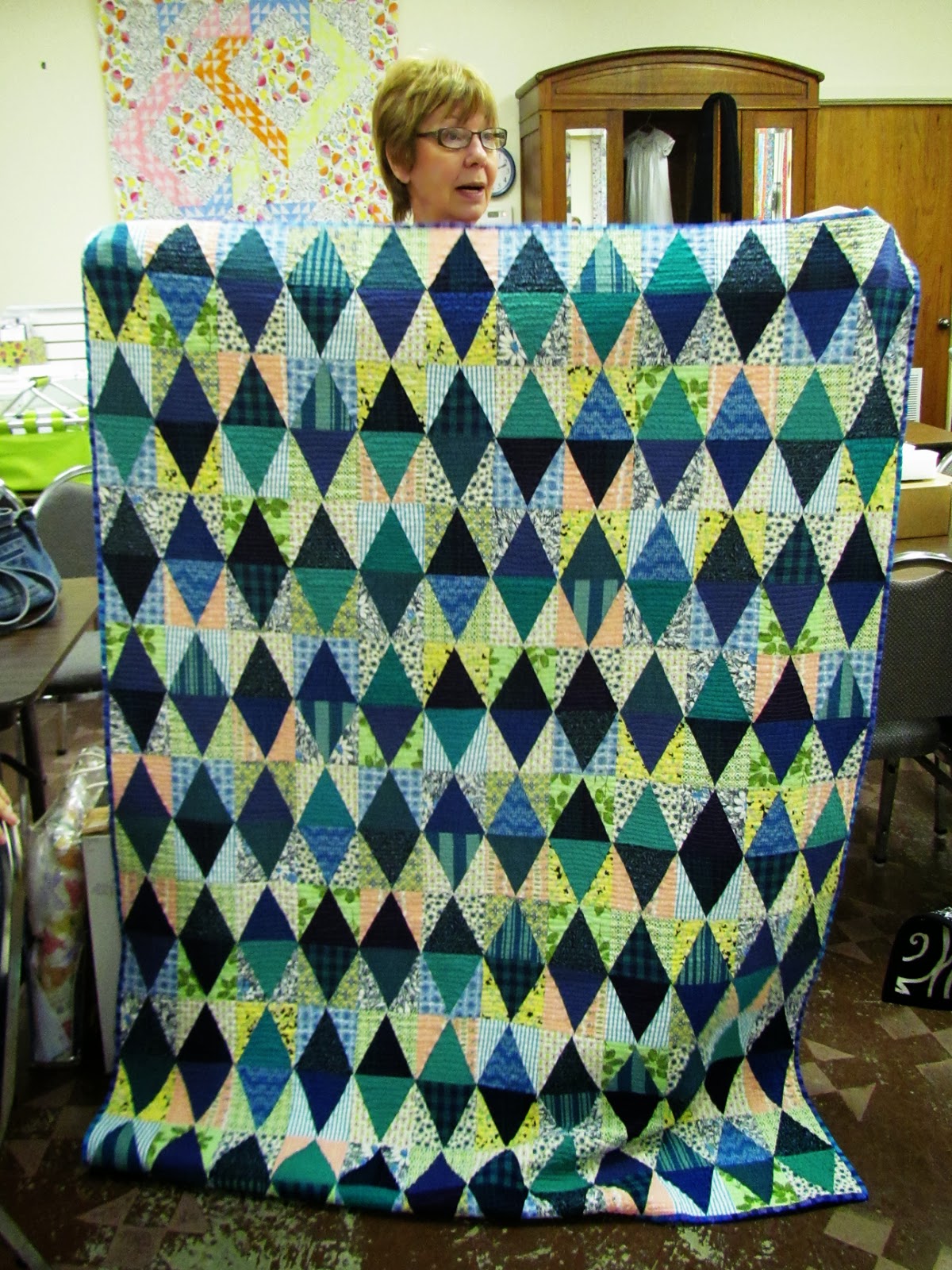 vintage feed sacks in equalateral triangle quilt by Marty Mason