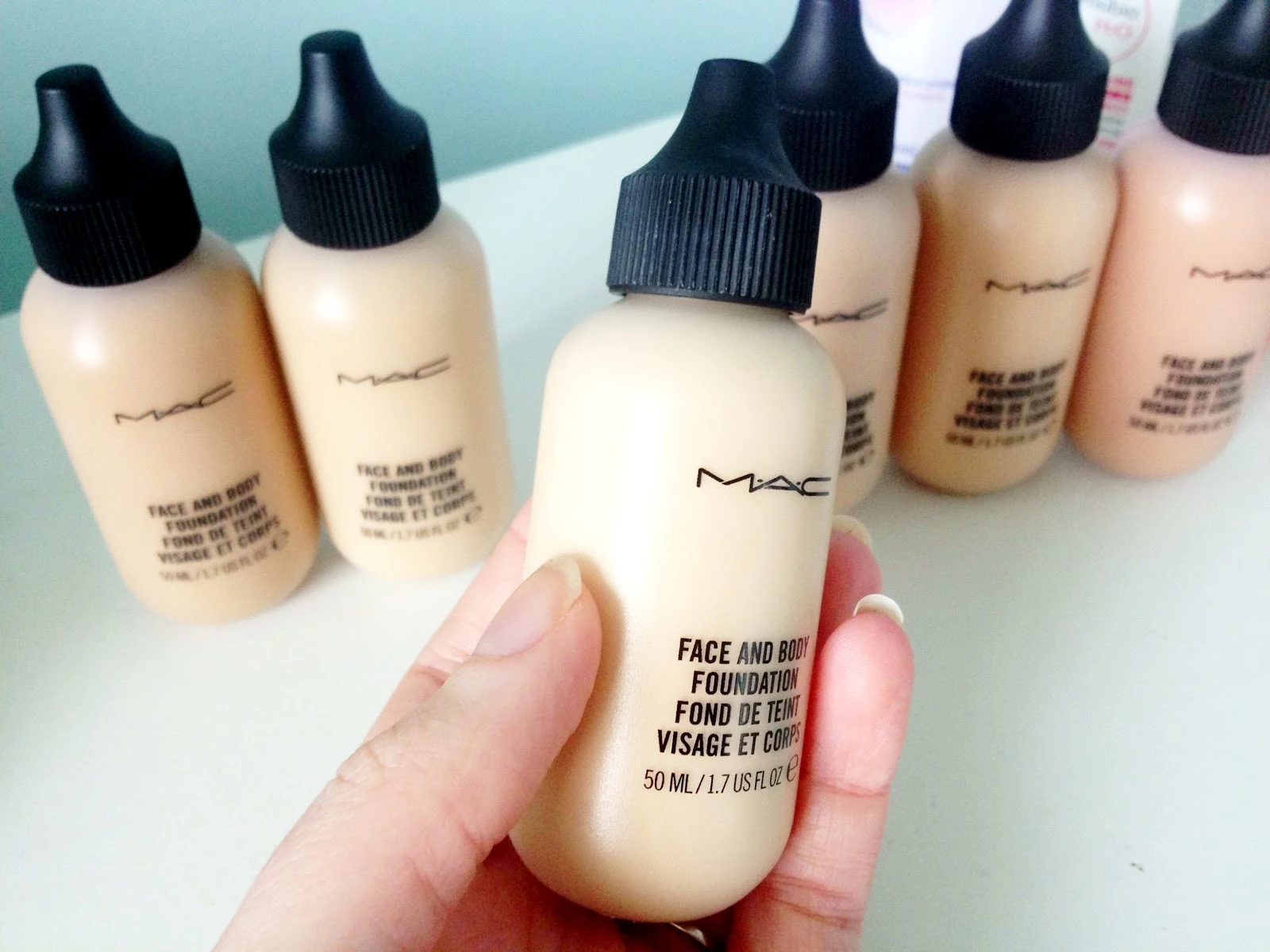 MUA foundation application on face