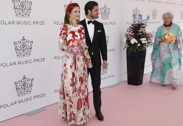 Princess Sofia wore a new silk floral maxi dress by Dolce & Gabbana, Crown Princess Victoria wore a new pink dress by Ida Sjostedt