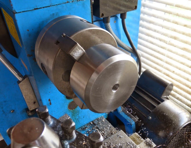 Turning a new steel furnace wheel in the lathe