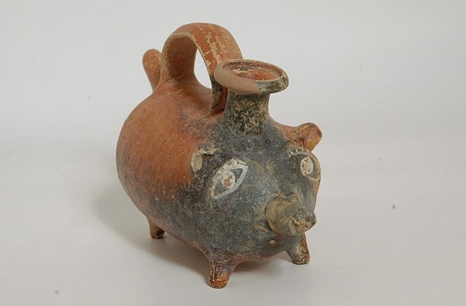 Ancient pig-shaped baby bottle found in Italy Ancient pig-shaped baby bottle found in Italy