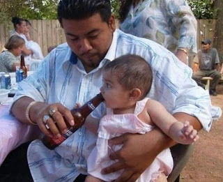 Baby drinking alcohol