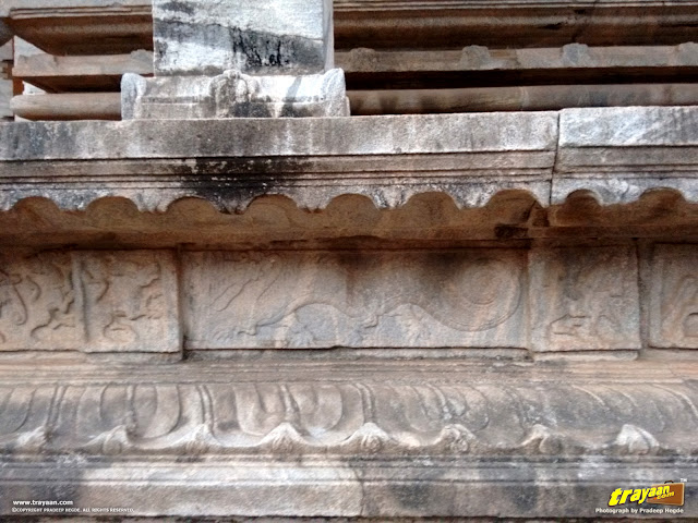Chinese Dragon and other carvings on the Thousand Pillared Jain Temple in Moodabidri, near Mangalore, Karnataka, India - called as Tribhuvana Tilaka Chudamani basadi or Chandranatha basadi, also known as Saavira Kambada Basadi in Dakshina Kannada district, near Mangalore, Mangaluru, Karnataka, India