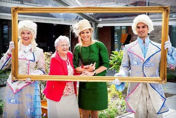 Queen Maxima wore green outfit by Natan Edouard Vermeulen. tanteLouise Vissershaven care home residents