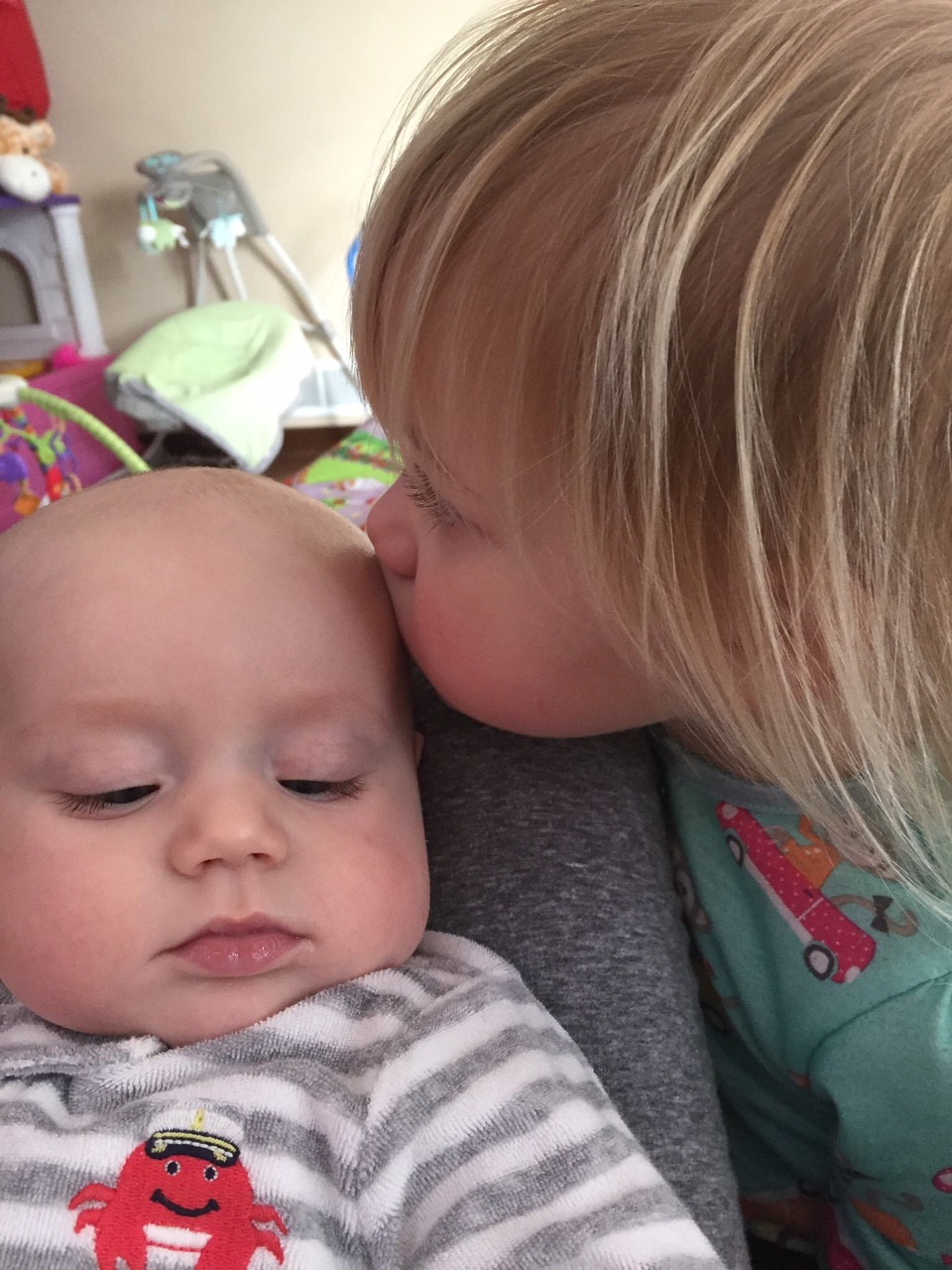 Big Sister Everleigh loving up Baby Brother Gideon!!