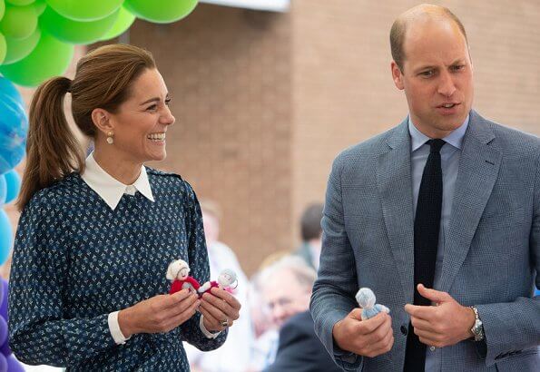 Kate Middleton wore a new floral print shirt dress by Beulah London. Crown Princess wore the same dress. Patrick Mavros quartz earrings