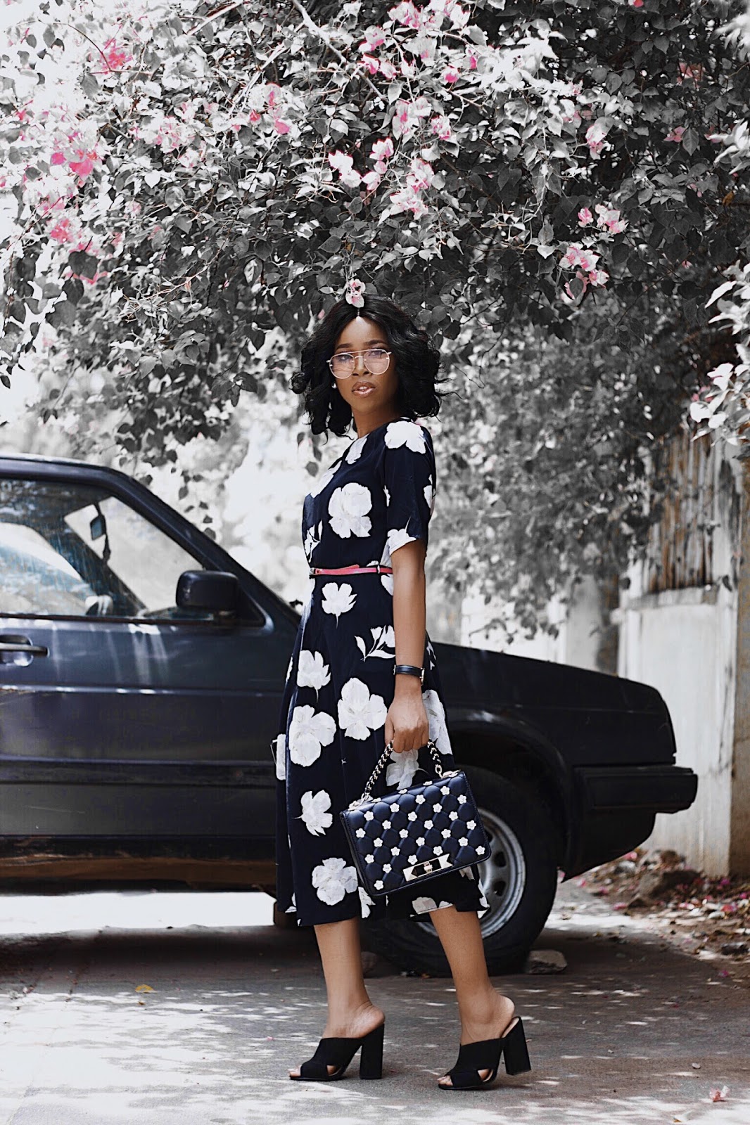 Grace Alex Nigerian fashion blogger in vintage floral dress and black mules
