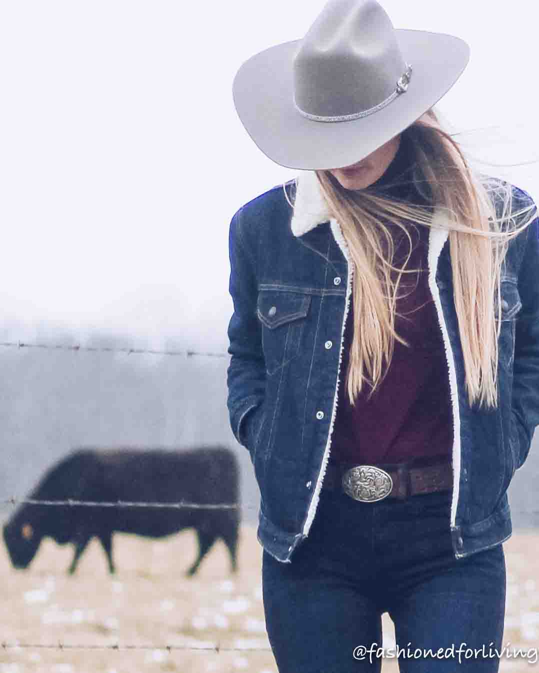 womens cowboy hat outfit with denim sherpa jacket, trouser jeans, ariat boots