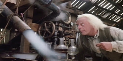 regreso volver al futuro emmett brown doc Christopher Lloyd robert zemeckis crazy scientist film chemistry flask