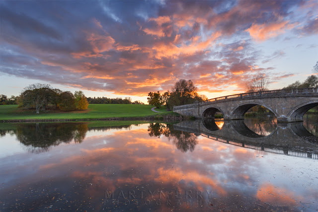 Sunset at Blenheim park reflected in the River Glyme in Oxfordshire by Martyn Ferry Photography