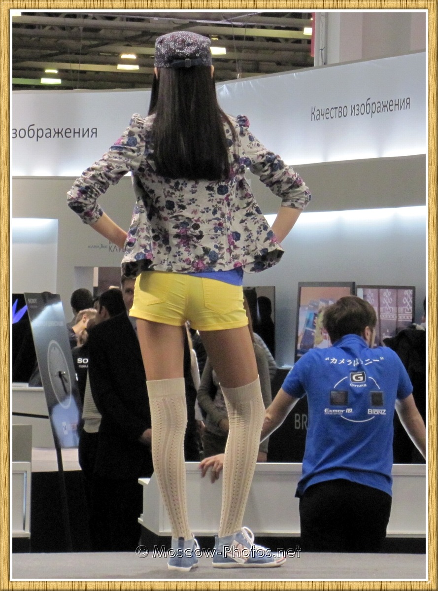 Model in yellow shorts at Photoforum 2011