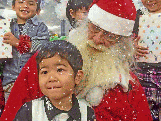 Santa and child, Motion GIF with snowflakes
