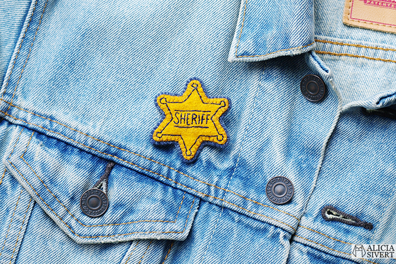 Sheriff-stjärna, broderad brosch av Alicia Sivertsson. / Sheriff star badge, embroidery by Alicia Sivertsson.