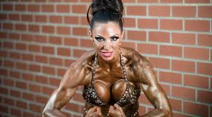 Jodie Marsh posing with grease on her body