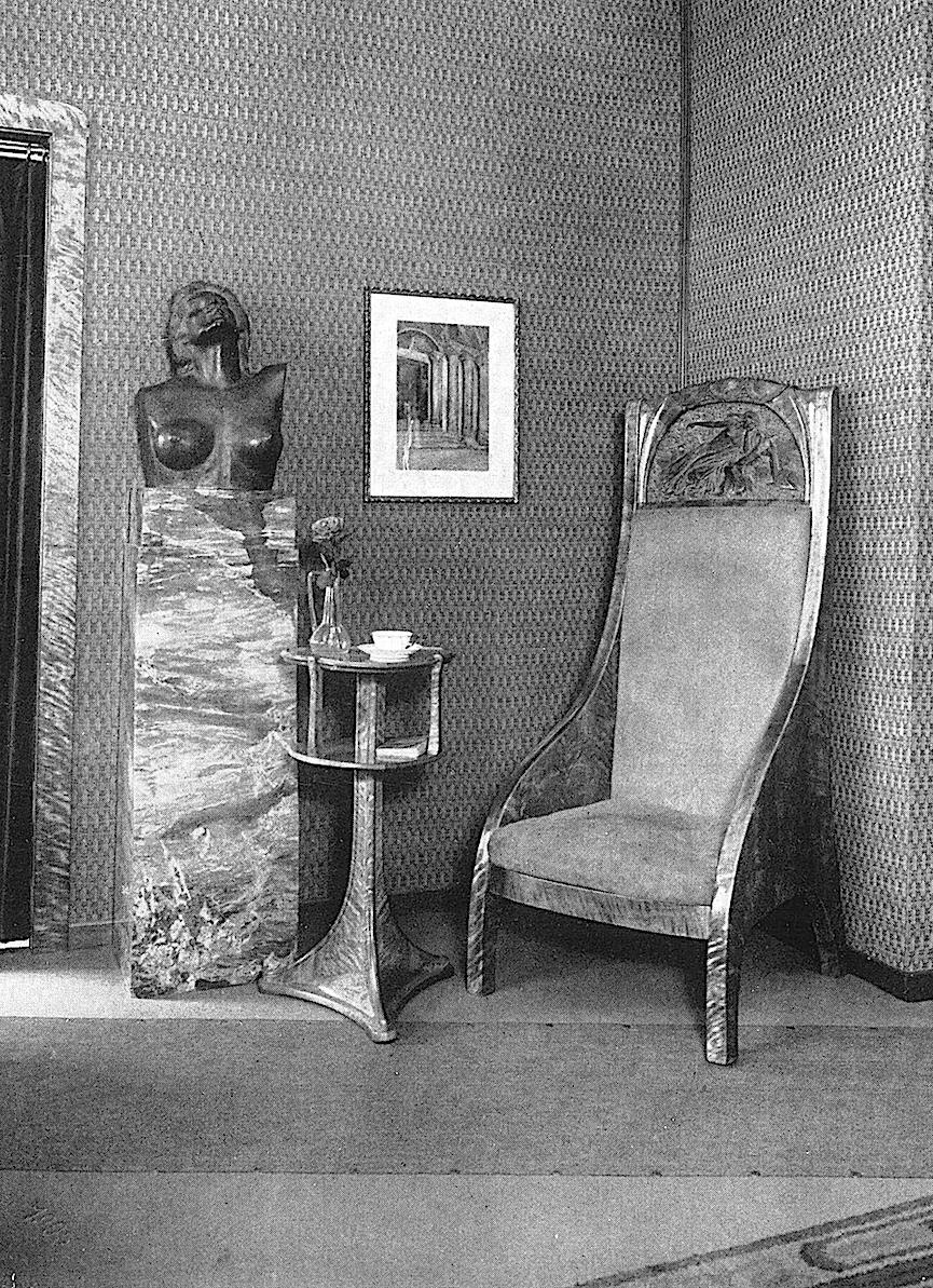 1905 interior photograph of a 1905 interior with upholstered stone furniture, from an exposition in Germany?