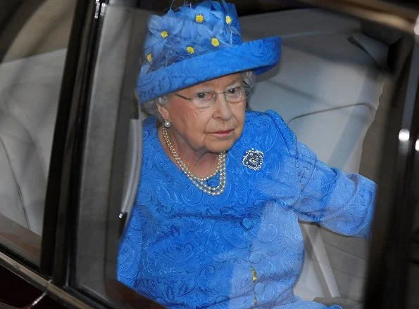 This year the Queen not wearing the imperial state crown and robes of state