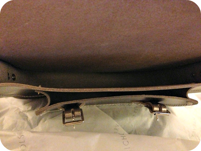 A picture of the inside of a Camrbidge satchel company satchel showing the pockets and the leather