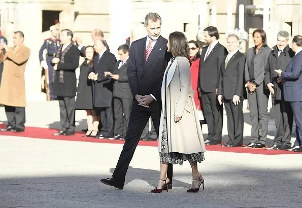 Queen Letizia wore Massimo Dutti snakeskin print dress with tie belt