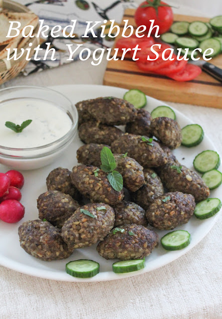 Baked Kibbeh: Lean beef seasoned with mint, onion, cumin and allspice is mixed with bulgur wheat then baked in small balls till golden. Perfect for dipping in garlicky yogurt sauce. #SundaySupper
