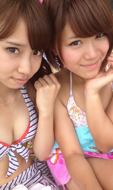 Two cute teens selfie with bikini