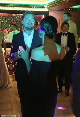 0 Actor Leonardo DiCaprio can't keep his eyes or hands off mystery lady at party (photos)