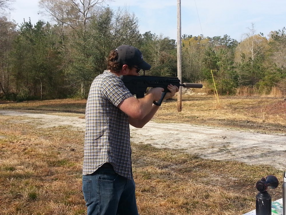 IWI Tavor 5.56 Xcaliber Firearms Mountaineer-D suppressor.