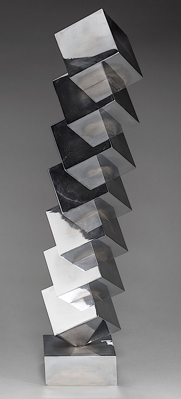Peter Nichols a Peter Nichols metal sculpture of stacked cubes, a color photograph