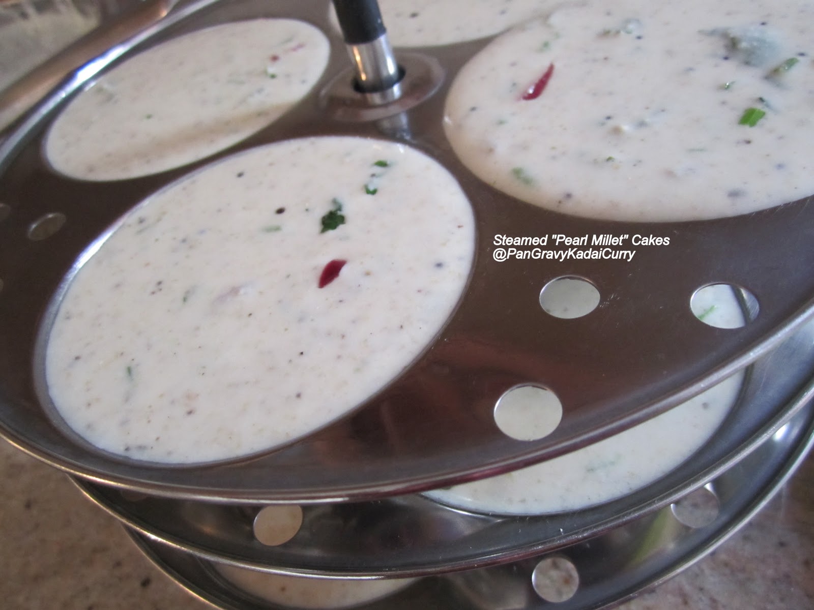 Pan Gravy Kadai Curry Steamed PearlMillet Cakes "Bajra/Kambu Idli" With Smashed Eggplant and