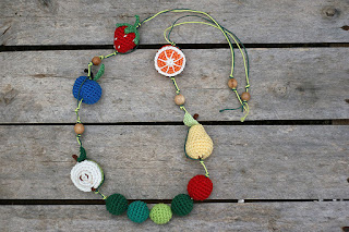 The very hungry caterpillar crochet teething baby wearing necklace