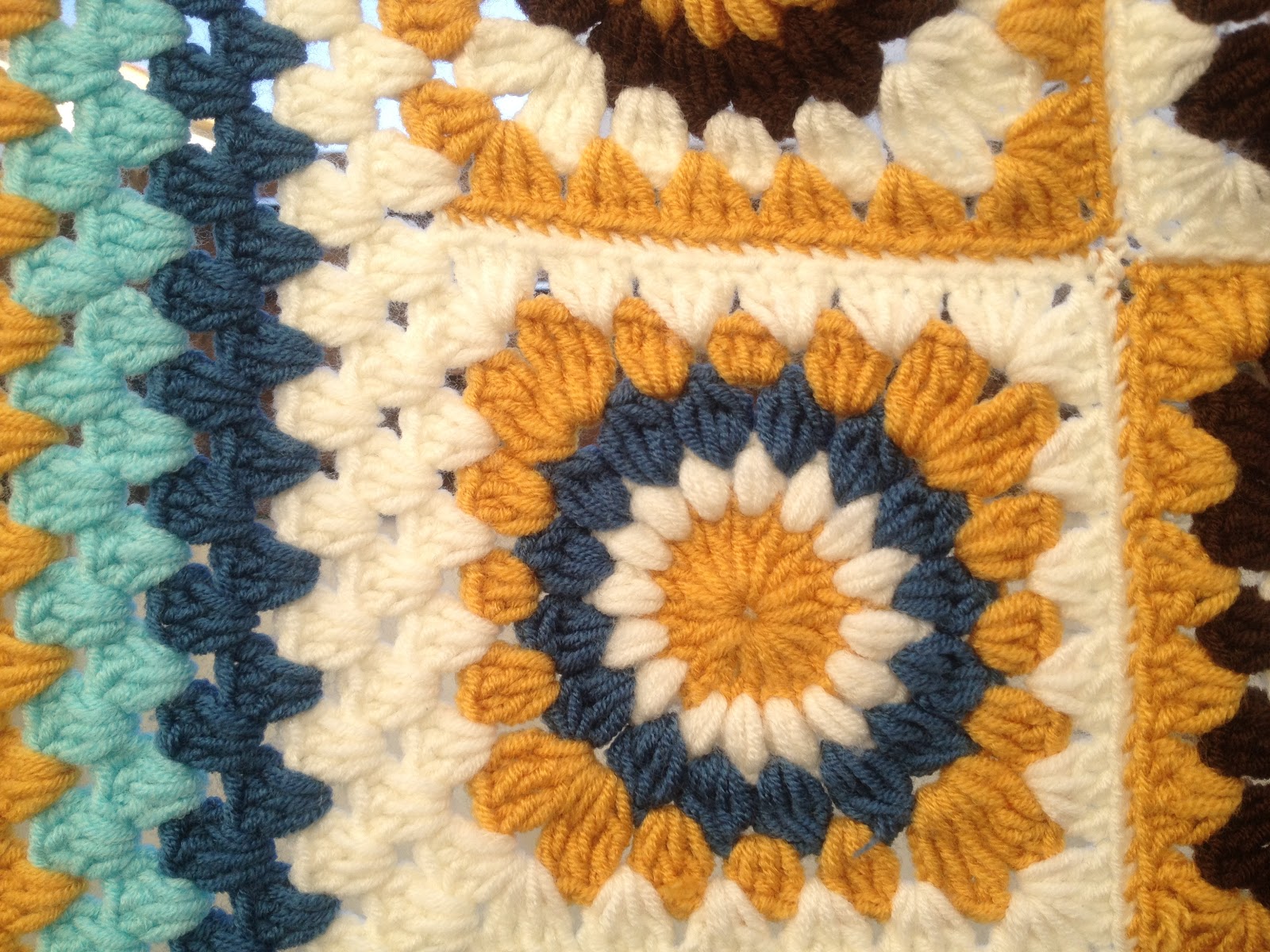 Gaia's Crochet Sunburst Granny Square Baby Blanket Tadah!