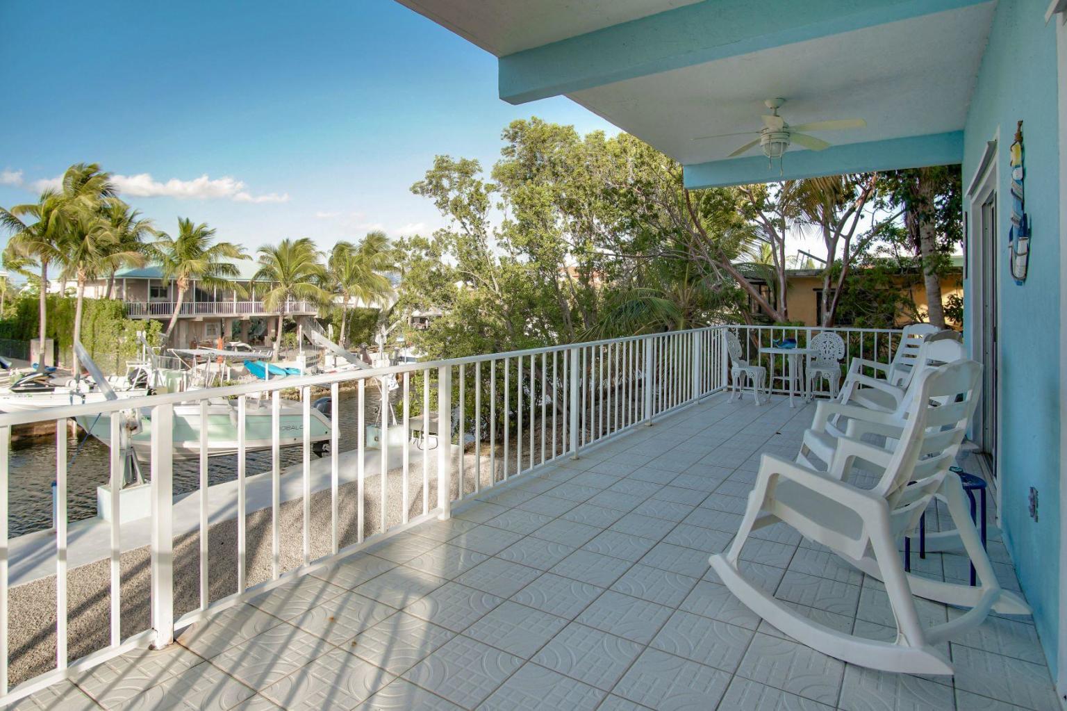 Real Estate in the Florida Keys 3/3 Concrete canal front in Key Largo 830K