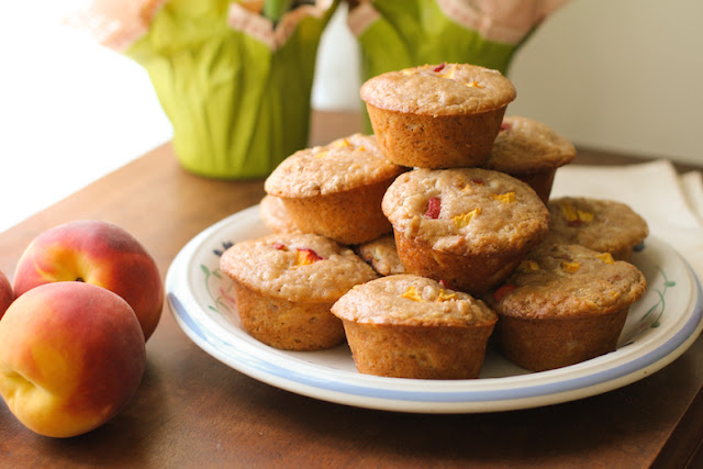 Food Lust People Love: Sweet Peach Cream Cheese Muffins celebrate the best of summer peaches with a wonderfully subtle tang. They are perfect for a summertime brunch, breakfast or snack.