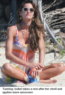 Pink bikini-clad Izabel Goulart is pretty as a picture as she stuns in the sun in St Barts
