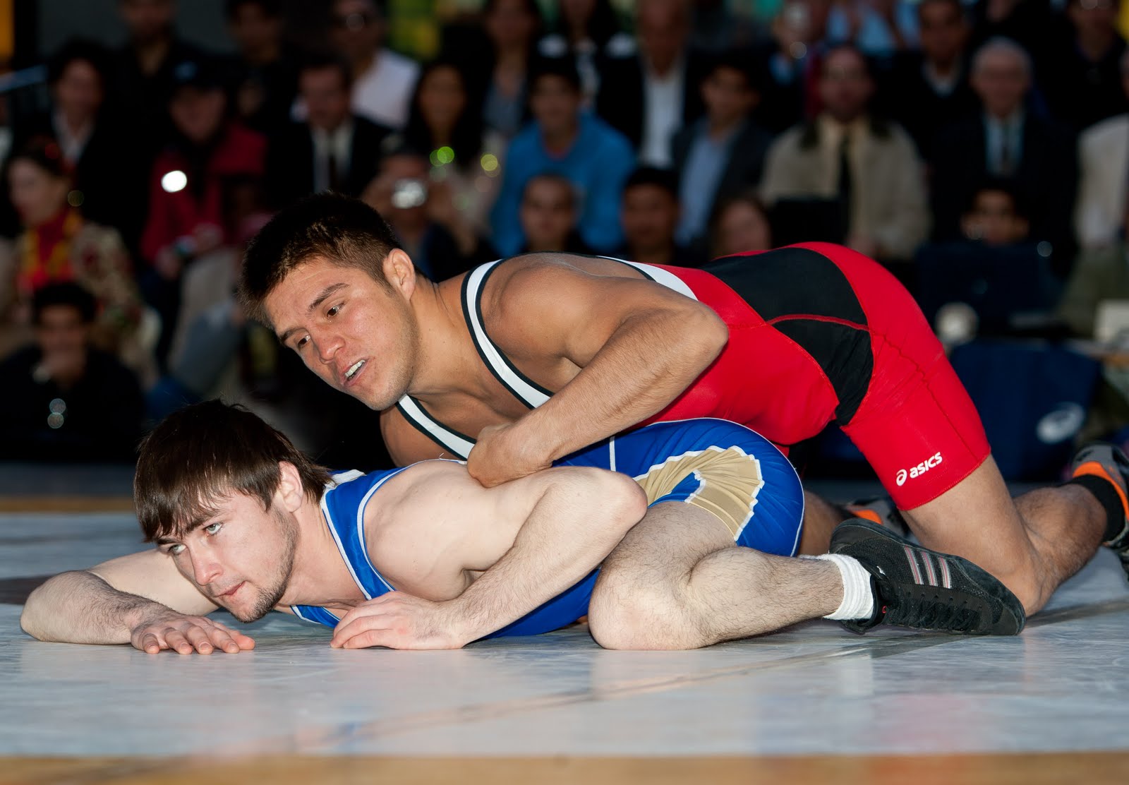 By Wrestling