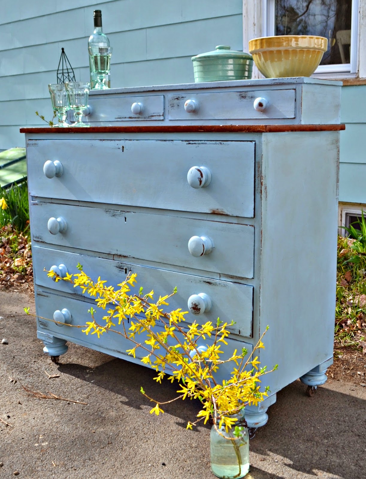 Heir and Space An Antique Dresser in Powder Blue