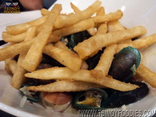 steamed mussels and clams in creamy blue cheese sauce