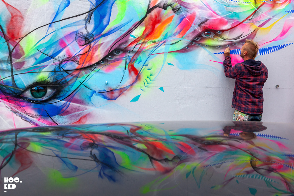 Brazilian street artists L7M paints bird mural in Cheltenham