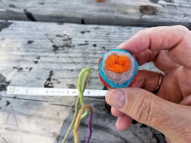 Make the felted-wool garland from my boho patio - stringing 2 www.BoHoHome.com @bohosusan