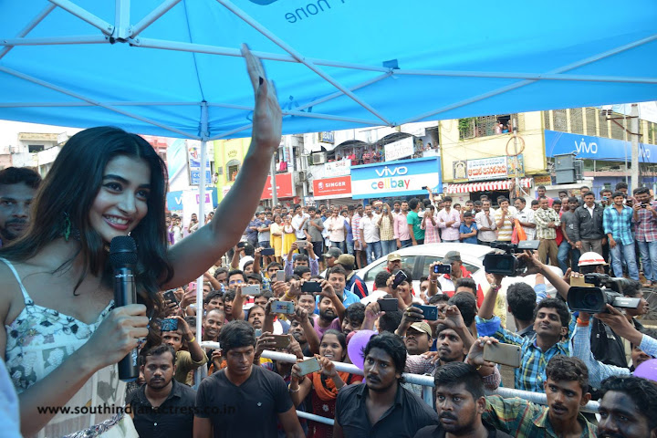 Pooja Hegde at Lot Mobile Store in Vijayawada