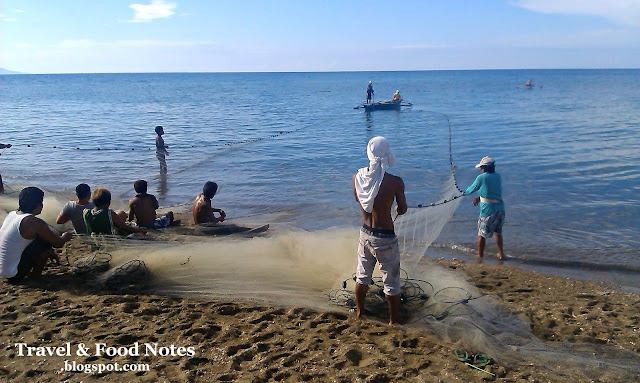Locals catching fish early in the morning